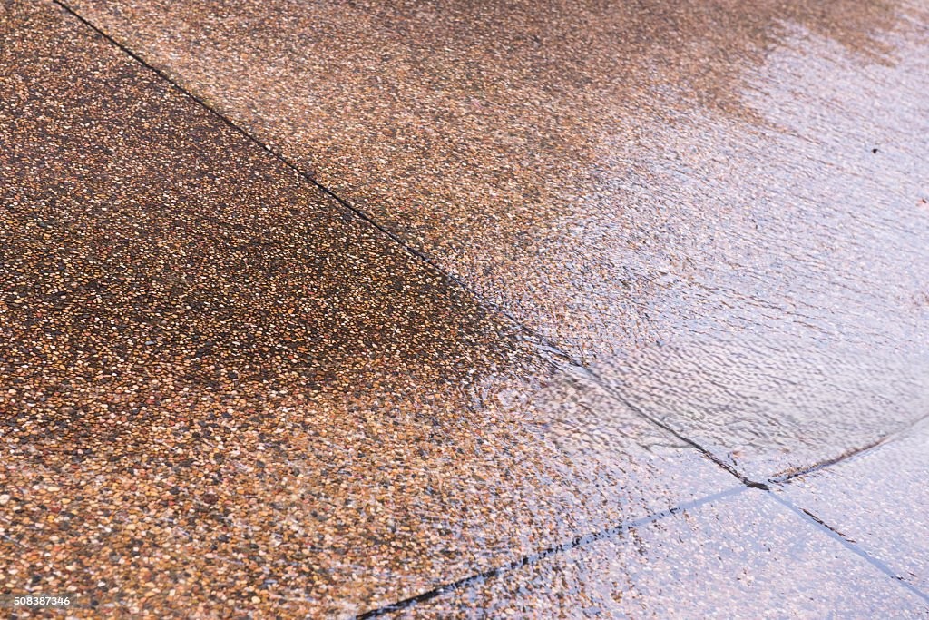 Glossy sealed concrete surface